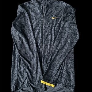 Nike Men's Black Patterned Windbreaker with Yellow Accents